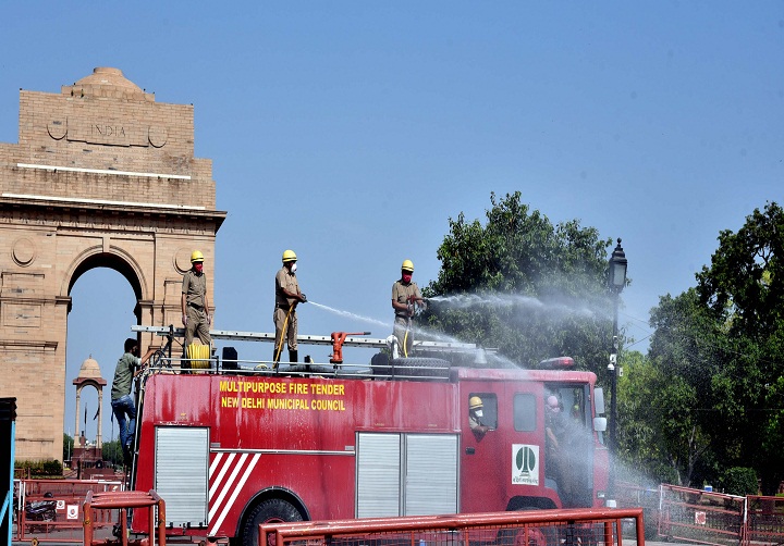 NDMC employees sanitizing at India Gate in New Delhi due to Corona virus