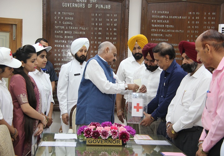 Punjab Governor and Administrator UT Chandigarh, Shri V.P.Singh Badnore releasing the Red Cross Flag 